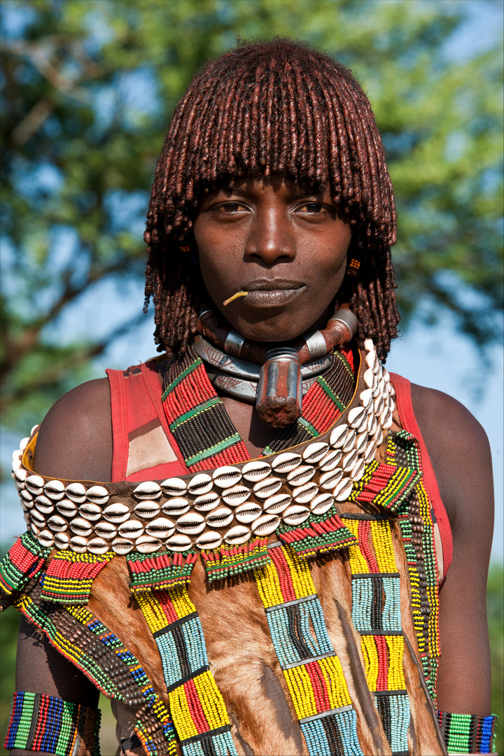 [ Hamer Tribe Woman with Leather Clothing and Shells ]