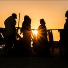 Handel am Strand, spätabends