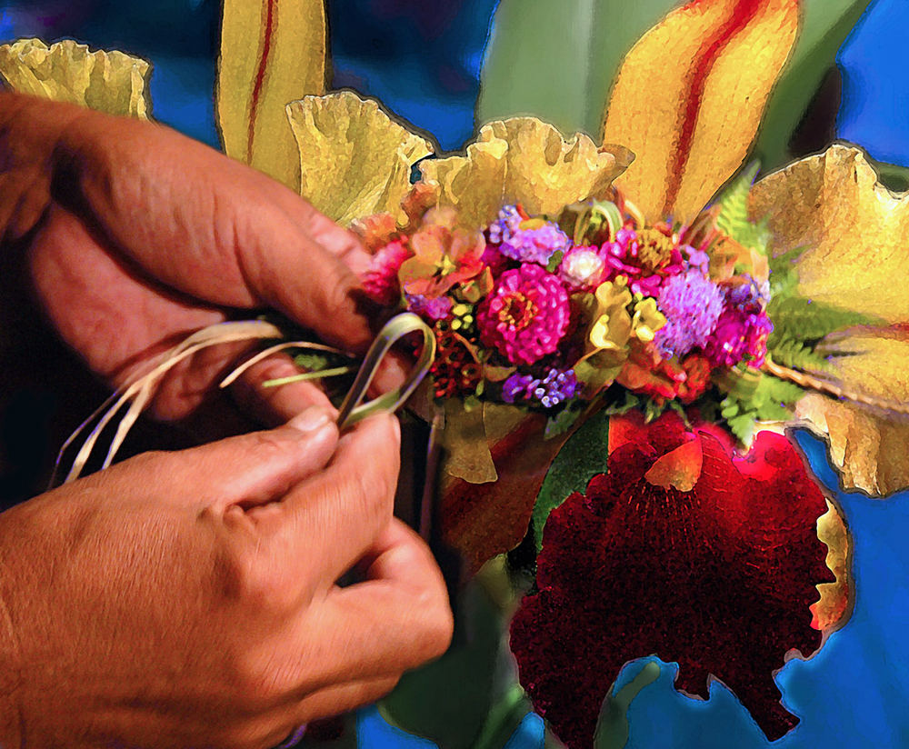 Hands of a lei maker