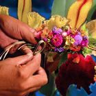 Hands of a lei maker