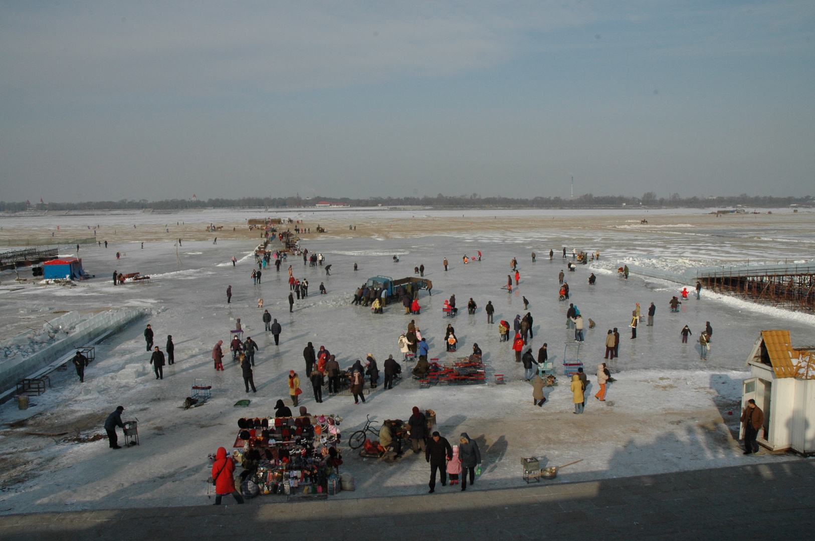 Harbin China 1.000s' of people work to get the ice ready from the frosen river