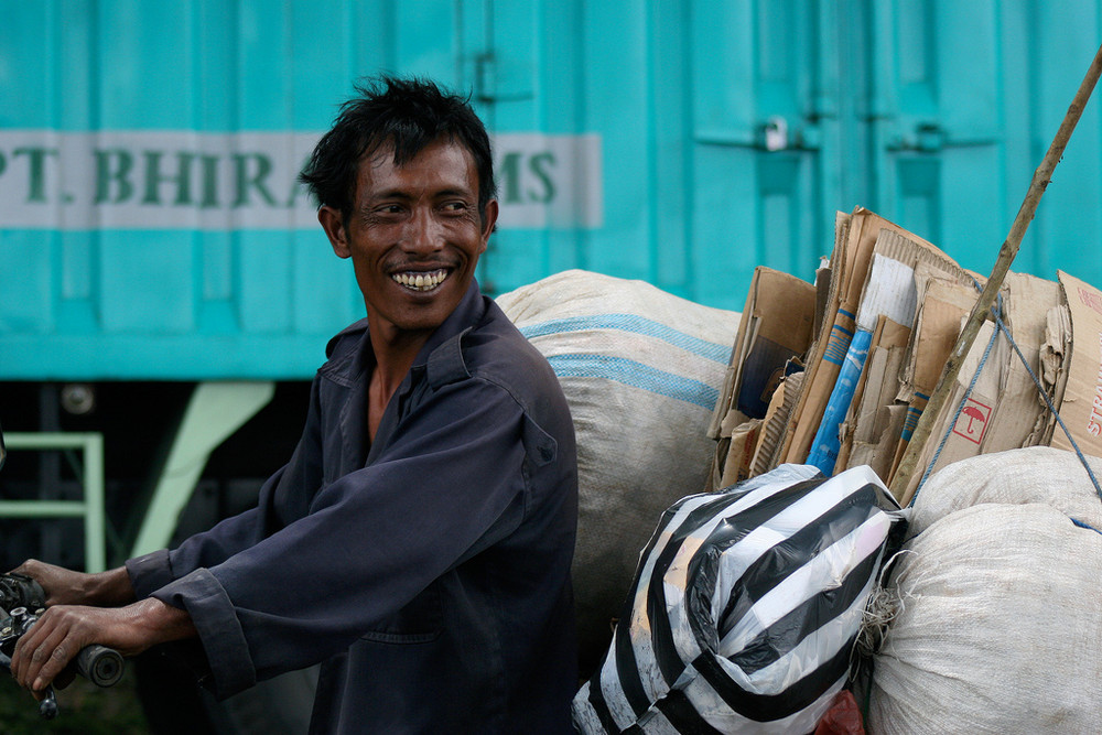 Hard working man still manages to smile :)