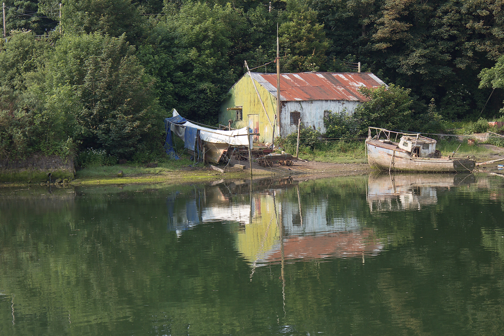 Haus mit Boot