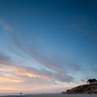 Haus und Sonnenuntergang am Meer