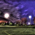 HDR-Aufnahm farbenkräftiges Wolkenspiel über Volkswagenparkplatz in Braunschweig