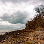 Headland and distant storm.