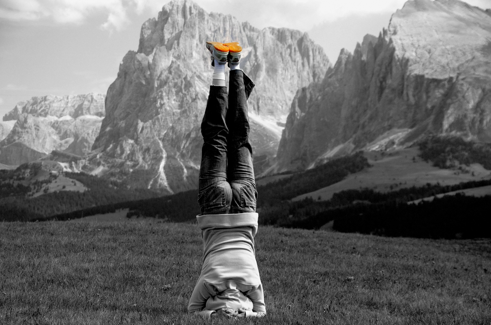 Headstand in Front of the Langkofel Mountain Italy