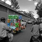 Heavy load on motorcycle in HCMC - Vietnam