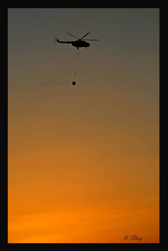 HELICOPTER AND SUNSET