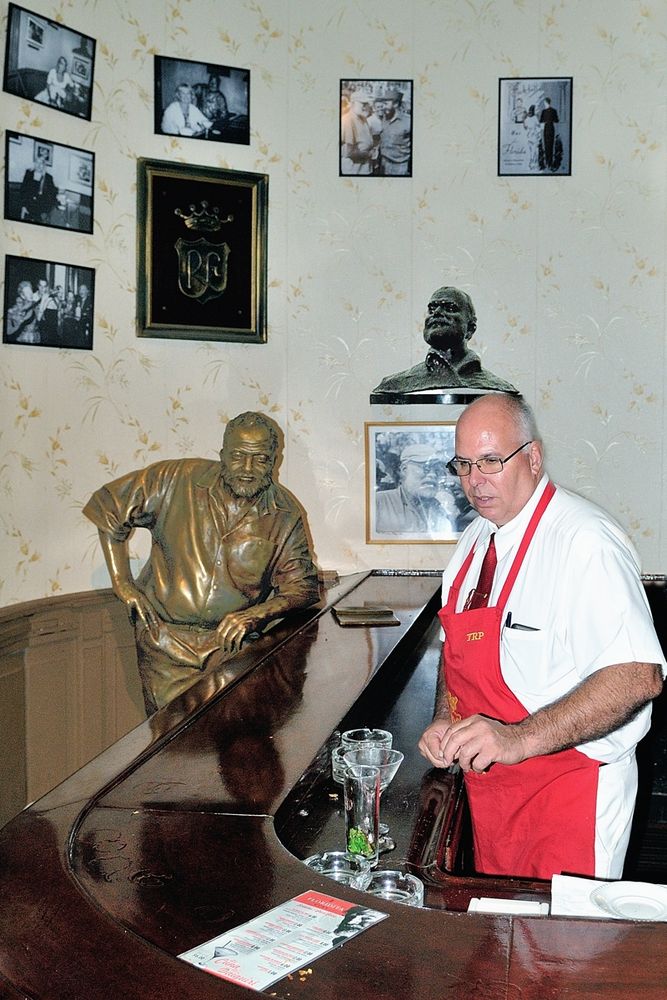 Hemingway as guest inside a bar in Havana Vieja