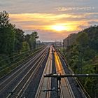 Herbstlicher Sonnenuntergang an der Bahnlinie