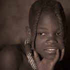 Himba girl in hut