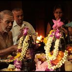 Hindu priest conducting ceremony in Sri Mariamman Temple, Kuala Lumpur