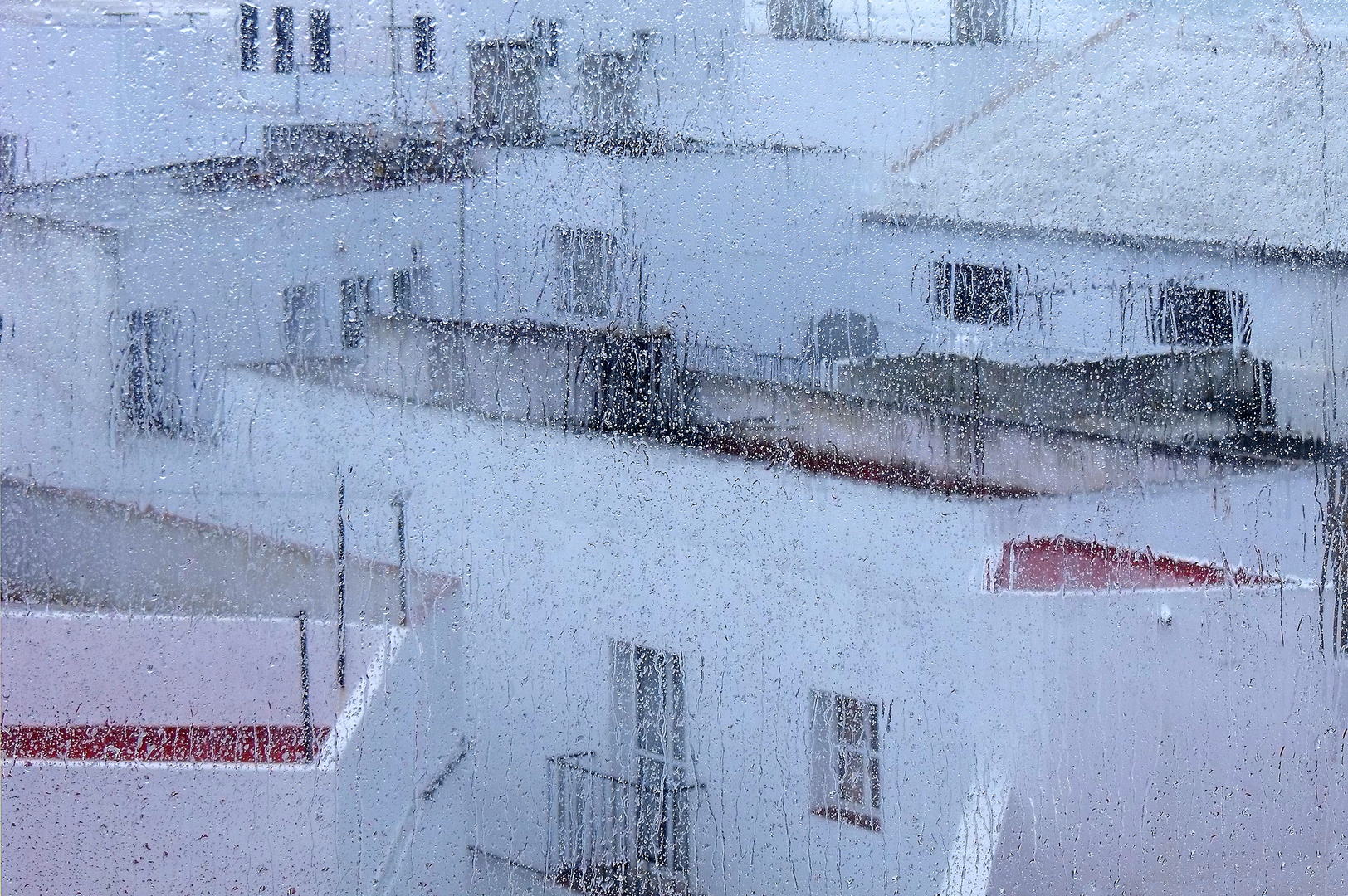 Hinter Glas - Regen in Conil de la Frontera