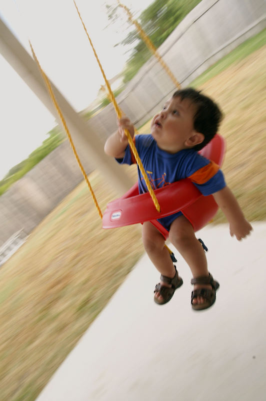 ...his first ride on the swing.