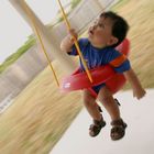 ...his first ride on the swing.