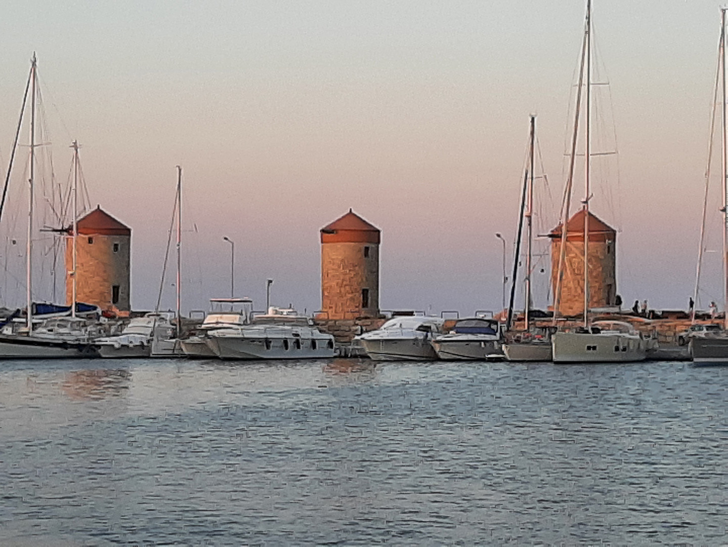 Historical Windmills at the  Harbour of  Rhodes Greece
