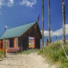 Historisch inspiriert - Holzhütte mit Spiegelfenster