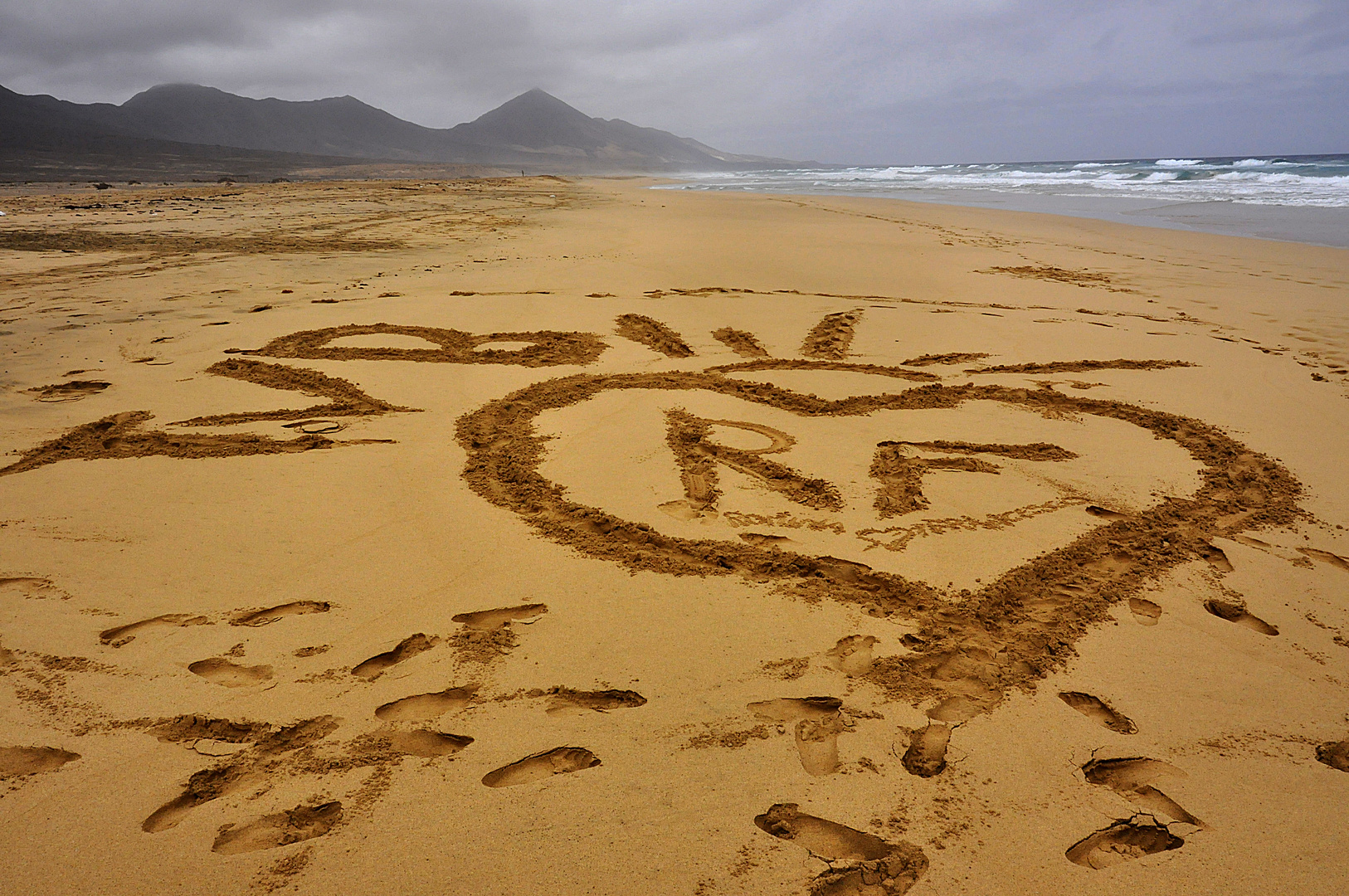 Ho scritto t'amo sulla sabbia....