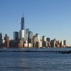 Hoboken 25. Peaceful birds. View across Hudson River to the new World Trade Center.