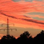 Hochspannungsmast in der Abendsonne