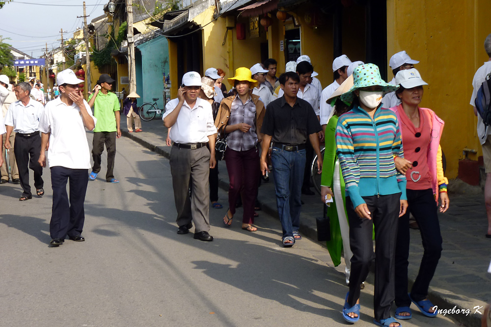 Hoi An - Vietnamesen auf dem Weg zur Arbeit