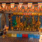 Holy altar on the steps to the reclining Buddha