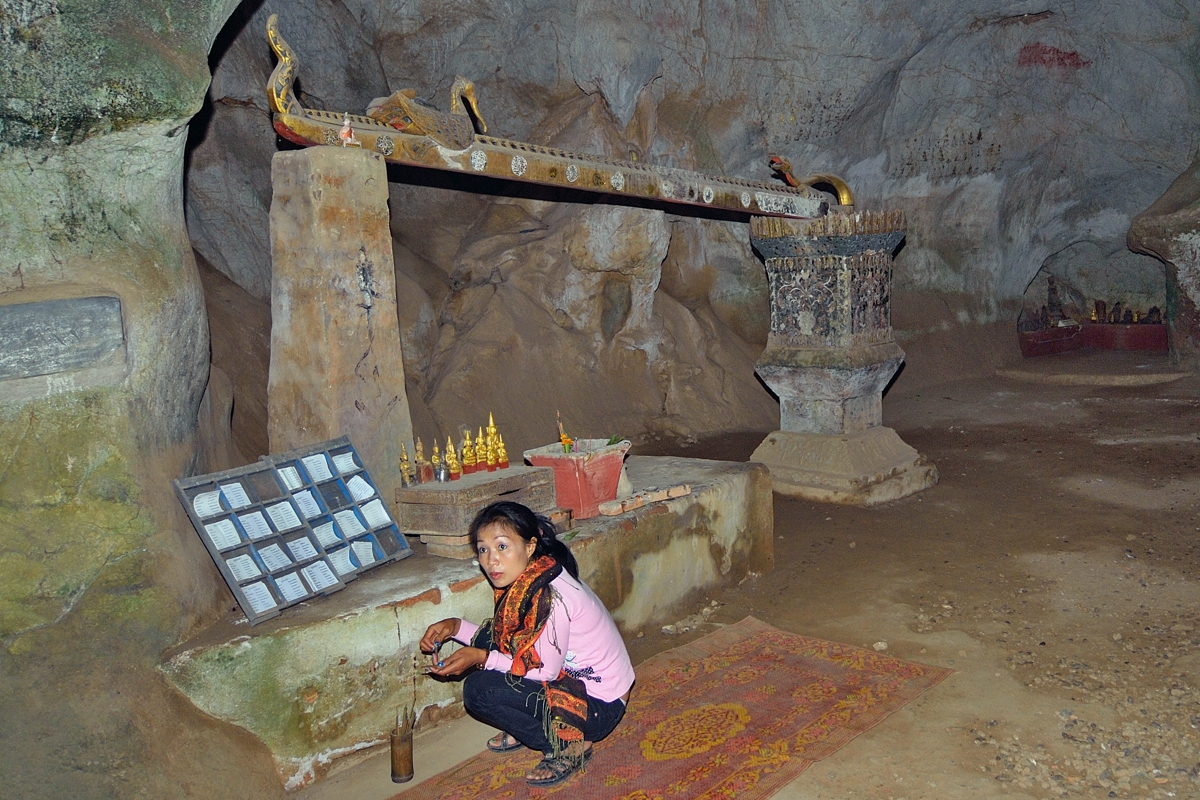 Holy water groove inside Tham Theung