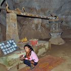 Holy water groove inside Tham Theung