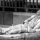 homeless silver guy