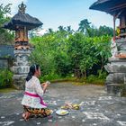 I Gusti Agung Ayu Swasti praying in the home temple