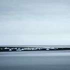 ice on black sand