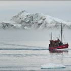 icebergs and boats