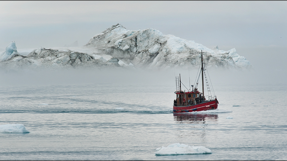 icebergs and boats