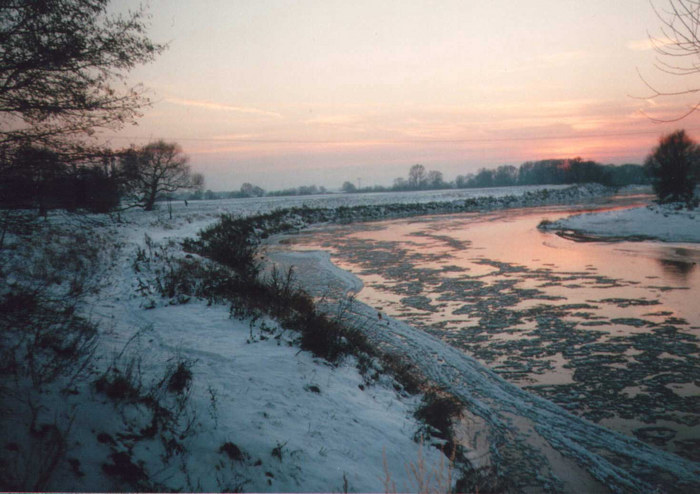 icy river at sunset