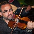 Ikaria/Greece - Nikos Fakaros playing during panigiri in Pezi