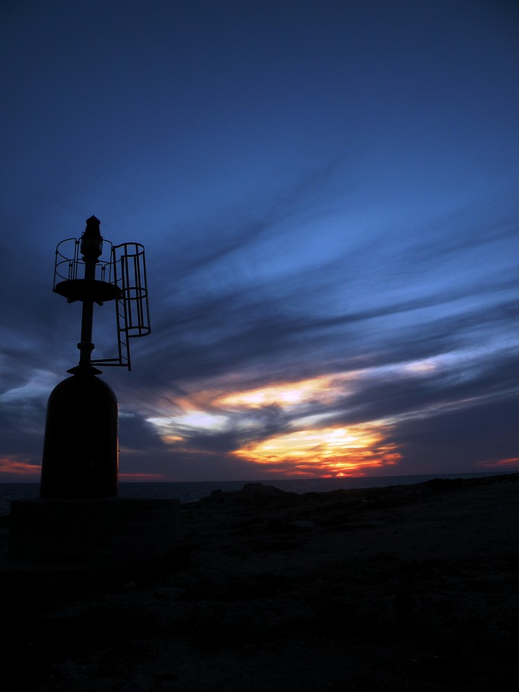 Il faro ed il tramonto