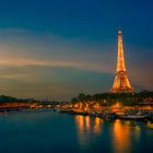 Illuminated Eiffel Tower during Sunset
