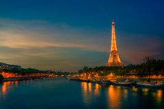 Illuminated Eiffel Tower during Sunset