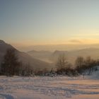 Im Neuschnee mit Blick auf den Luganersee