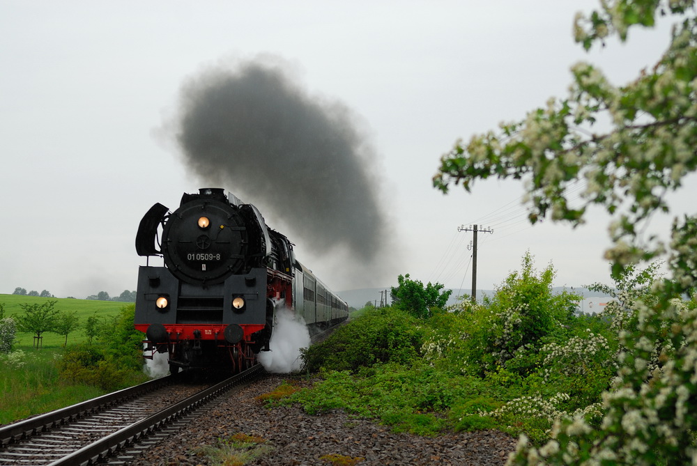 im strömenden Regen nach Hause