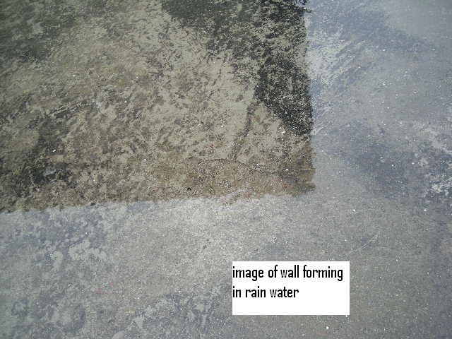 Image of Wall in rain water