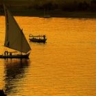 Imbarcazioni al tramonto sul Nilo