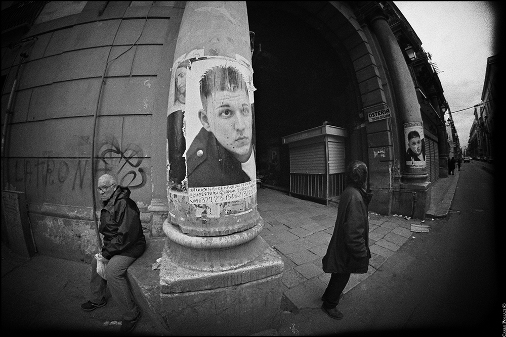 Imposing columns, intrusive big faces.