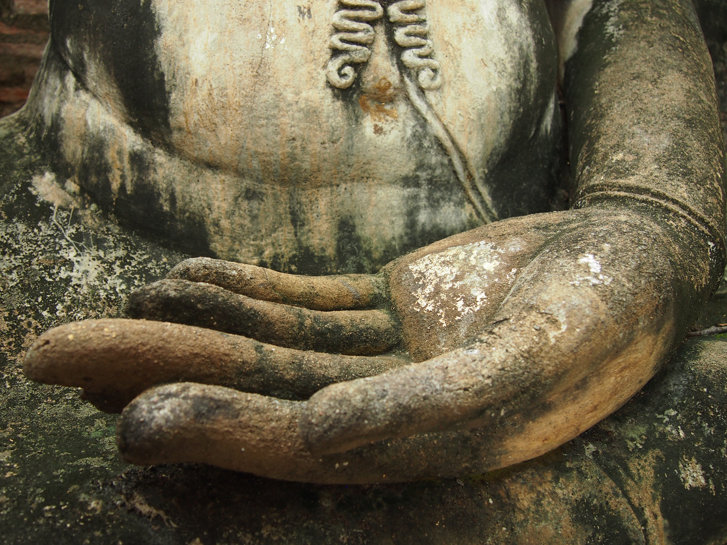 in buddhas hand (buddha in sukothai)