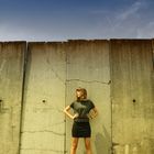 In front of the wall