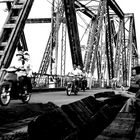 in the bridge built across a red river (hanoi-vietnam)