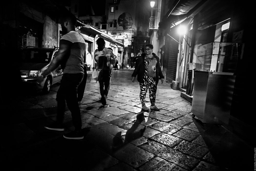 In the streets of the old city, evening.