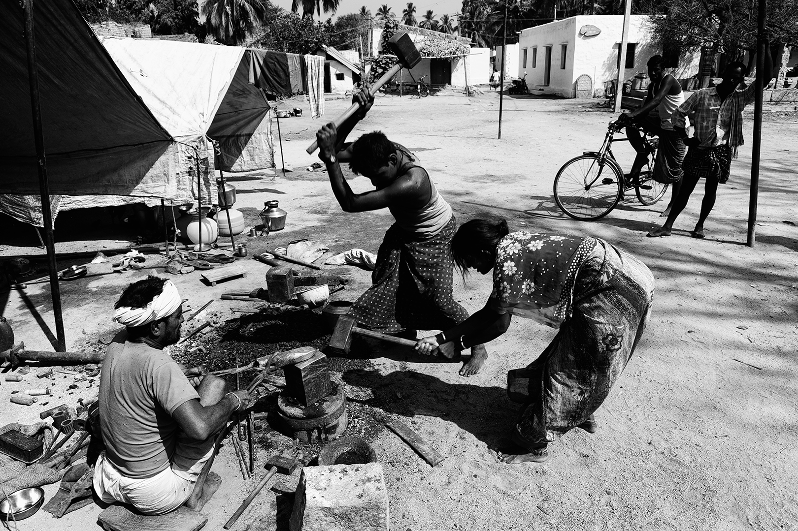 India Hampi Anegundi Blacksmith Woman and Men