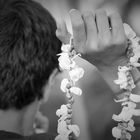 Indian boy selling flower Malas